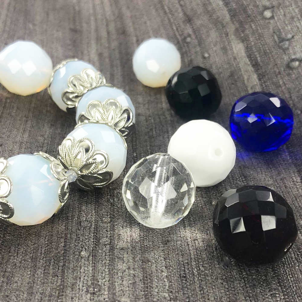 Facet kralen rond 18mm smokey wit per 1 stuk