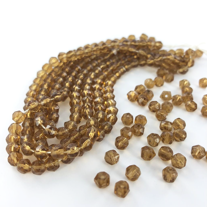 Half facet kralen 5mm rond bruin per 30 stuks