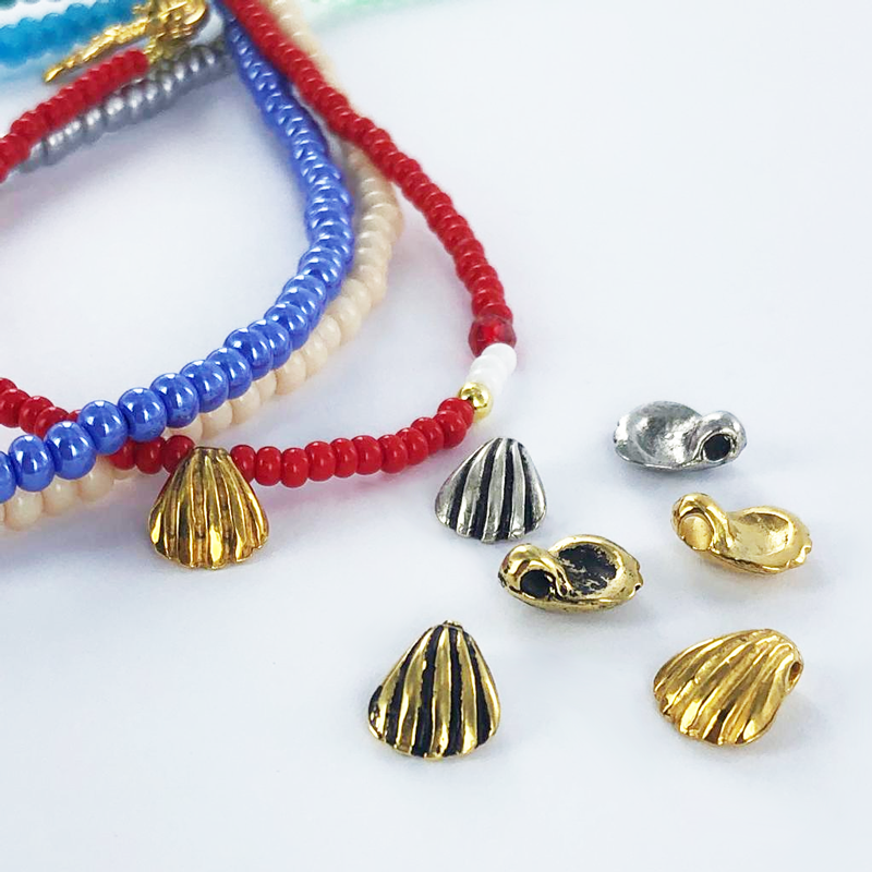 Vergulde hanger bedeltje schelp 10mm antiek goud per stuk