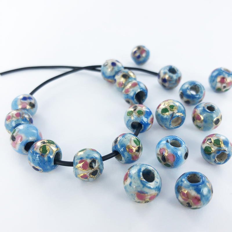 Keramiek porselein kralen rond 10mm blauw per 3 stuks