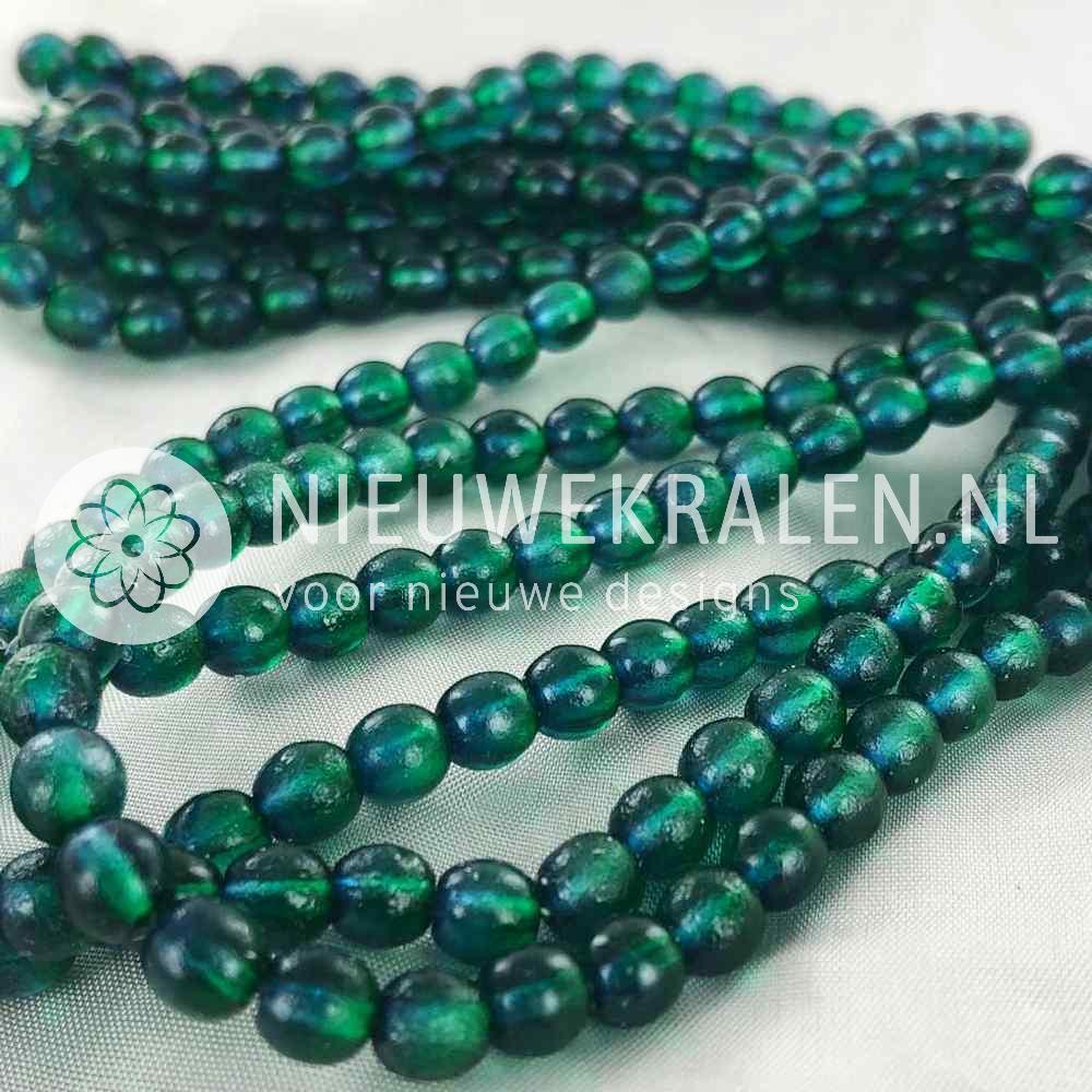 Glaskralen rond blauwgroen mat/glans 6 mm met karakteristieke afwerking