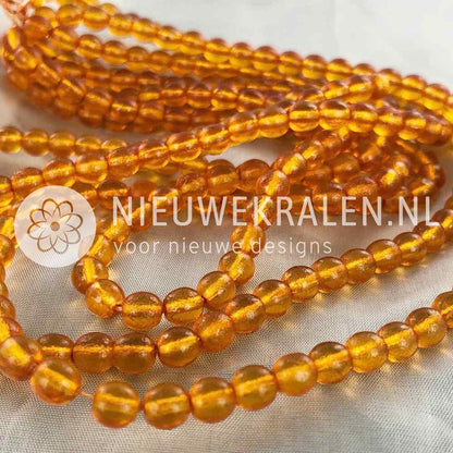 Glaskralen rond oranje mat/glans 6 mm met karakteristieke afwerking