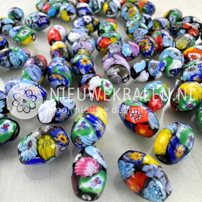 Millefiori kralen ovaal zwart-multikleur 13x9mm – handgemaakte glaskralen met kleurrijke bloemmotieven