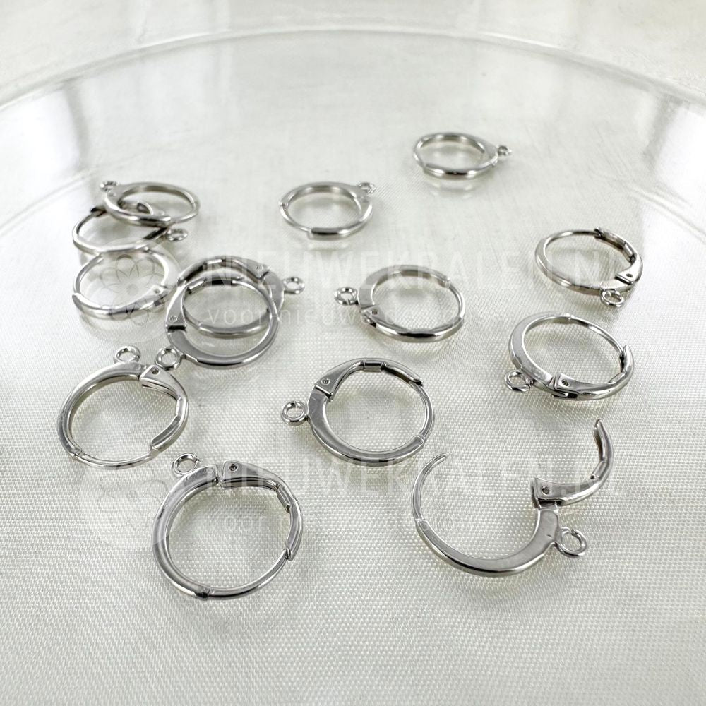 Zilverkleurige oorbellen met brisuresluiting rond 12 mm met oogje voor het maken van oorbellen