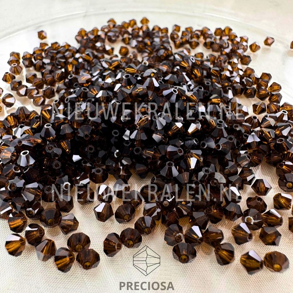 Losse Preciosa bicone kralen Chocolate 10250 4 mm in donkerbruine chocoladetint