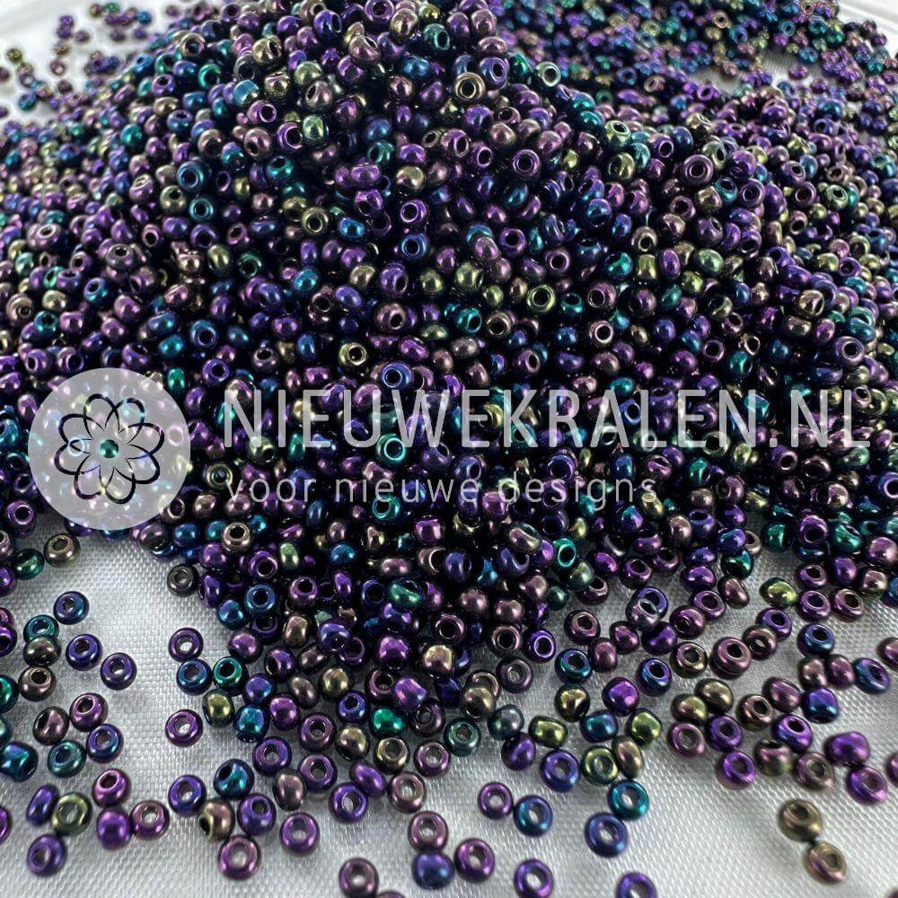 Preciosa rocailles 11/0 purple iris 2 mm Tsjechische glaskralen paars met groen en brons