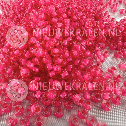 Preciosa rocailles 6/0 Crystal Colour Lined Pink (80998) – transparante Tsjechische seed beads van ca. 4 mm met roze kern/lining