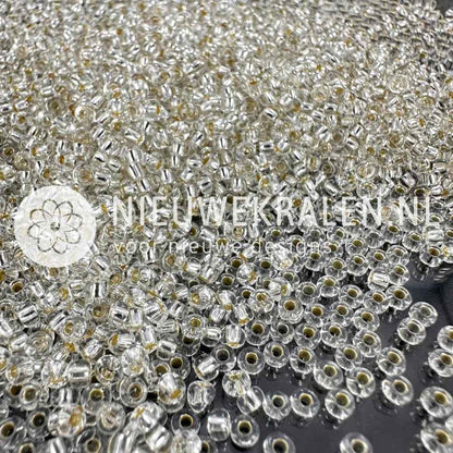 Preciosa rocailles 8/0 (3mm) crystal silverlined – Tsjechische glaskralen in transparant kristal met zilverkleurige kern, voor sieraden en borduren.