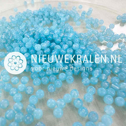 Pressed Beads glaskralen 4mm rond pastel blauw – Tsjechische Boheemse kralen, ideaal voor sieraden maken.