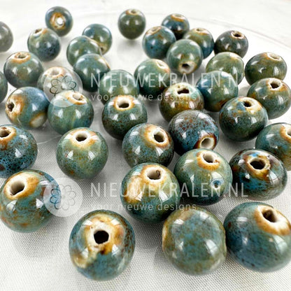 Raku kralen van Japans porselein rond 12 mm in turquoise