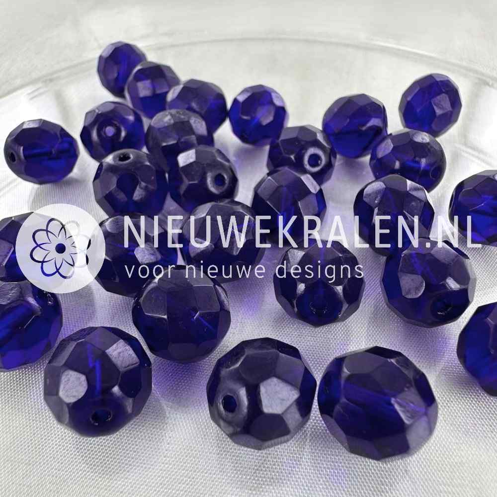 Tsjechische facet kralen 12 mm kobaltblauw – Fire Polished glaskralen van Preciosa in een transparant blauwe kleur.