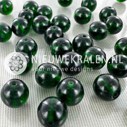 Tsjechische glaskralen rond 10mm emerald groen transparant – pressed beads Boheems glas