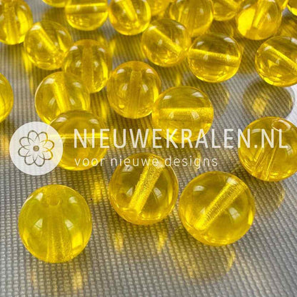 Tsjechische glaskralen rond 10mm geel transparant – pressed beads Boheems glas