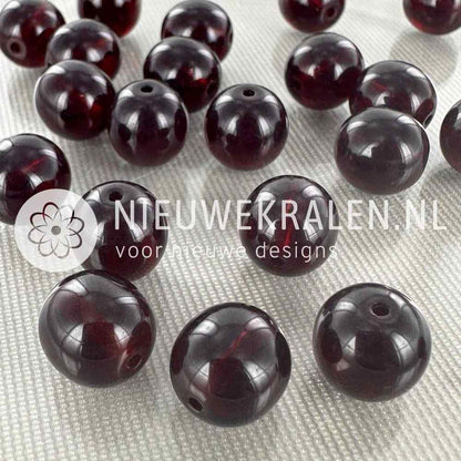Tsjechische glaskralen rond 10mm granaatrood transparant donkerrood – pressed beads Boheems glas