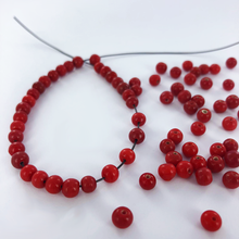 Afbeelding in Gallery-weergave laden, Bloedkoraal imitatie koraal kralen glas rond rood 5mm per 25 gram
