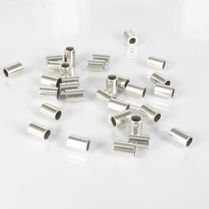 Buisjes kralen 5mm x 3mm zilver per 1 stuk