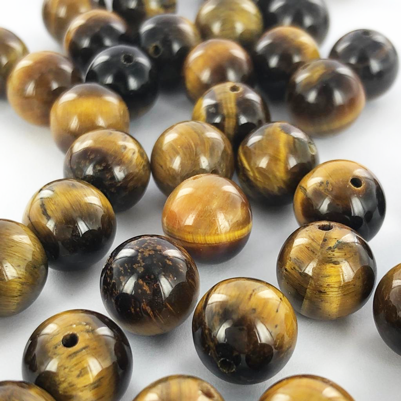 Edelstenen natuursteen kralen Tiger Eye AB 10mm rond per 1 streng