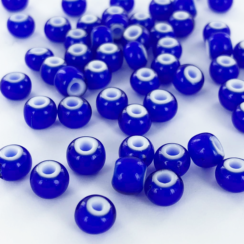 Glaskralen cilinder blauw met witte kern 7mm per 10 gram