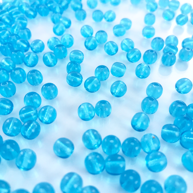 Glaskralen rond blauw 6mm per 50 stuks