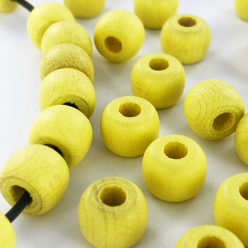 Houten kralen cilinder 10mm mat geel per 30 stuks