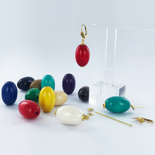 Afbeelding in Gallery-weergave laden, Houten kralen ovaal 24mm groen per 2 stuks
