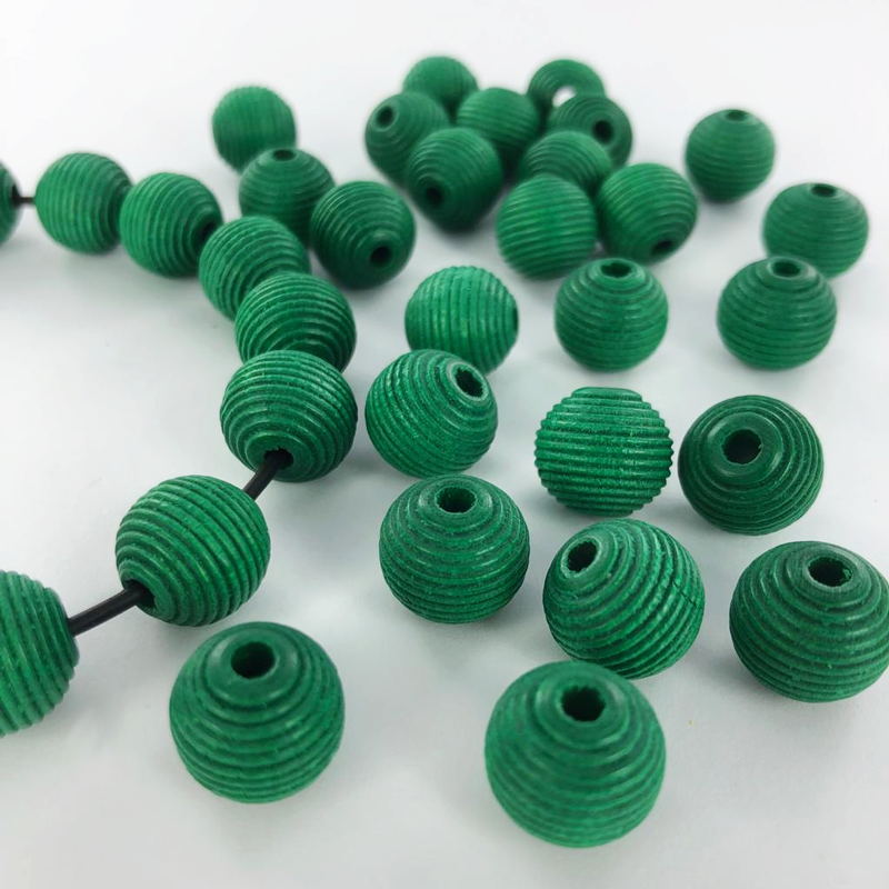 Houten kralen rond geribbeld 12mm mat groen per 20 stuks
