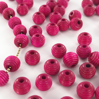 Houten kralen rond geribbeld 6mm roze per 20 stuks