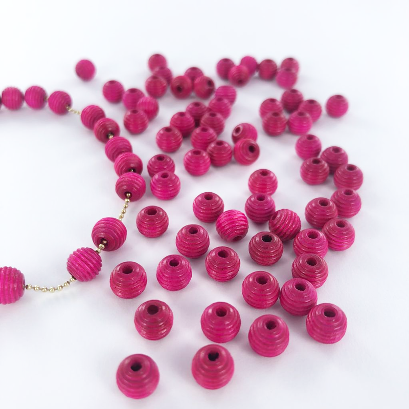 Houten kralen rond geribbeld 6mm roze per 20 stuks