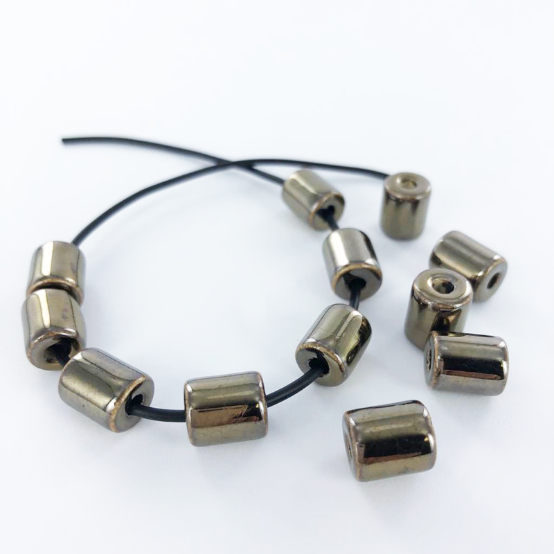 Keramiek porselein kralen cilinder 10mm brons per 3 stuks