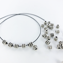 Afbeelding in Gallery-weergave laden, Metalen kralen spacer beads cilinder 5mm antiek zilver per stuk
