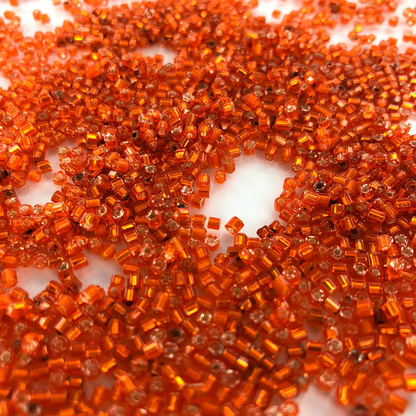 Staafjes kralen bugle beads 2mm oranje