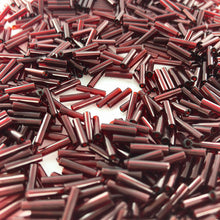 Afbeelding in Gallery-weergave laden, Staafjes kralen bugle beads 9mm rood

